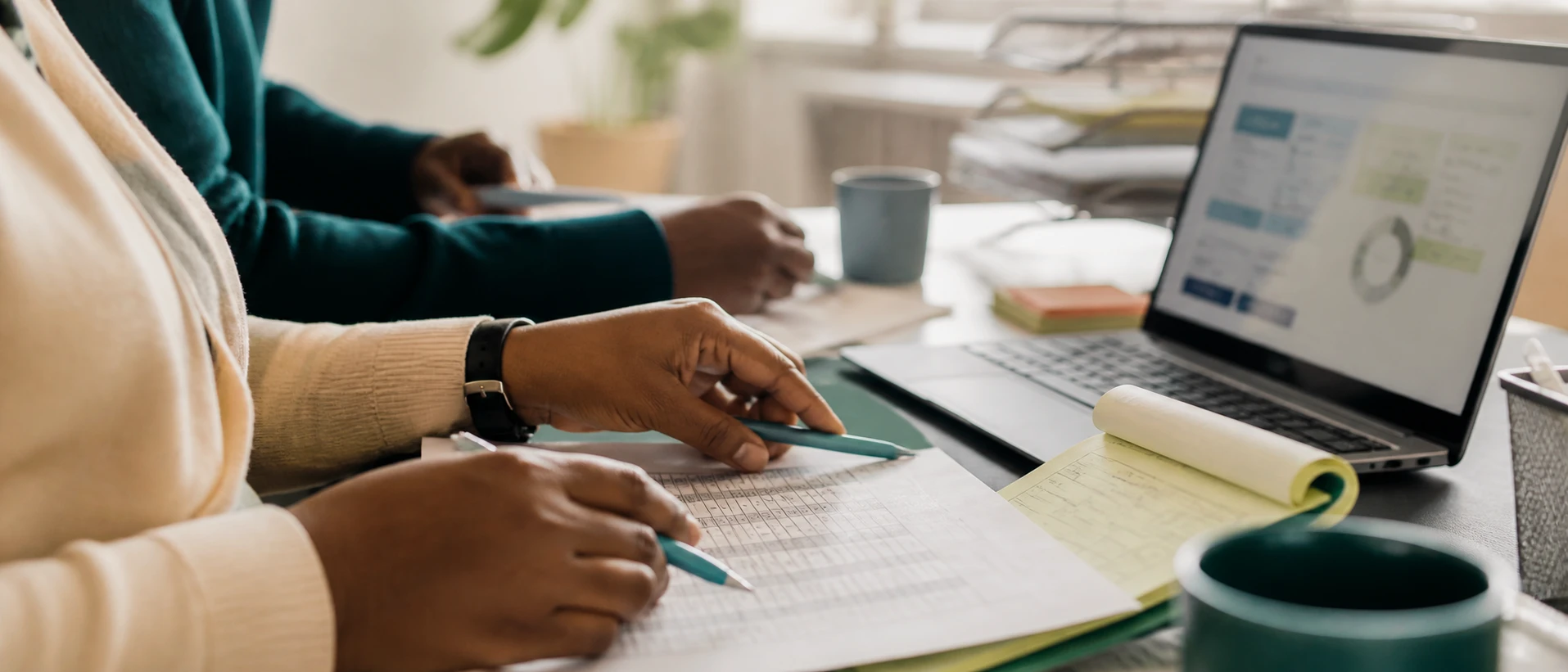 School staff coordinate a roster, receipt book and operations screen